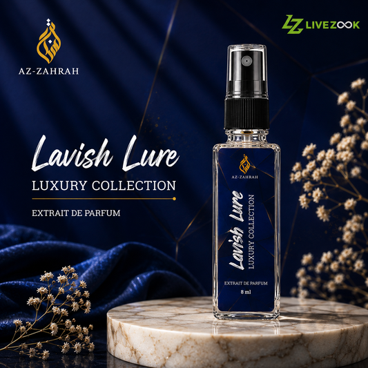A clear glass perfume spray bottle with a black spray top and a dark blue label reading 'Lavish Lure Luxury Collection' and 'Extrait de Parfum 8 ml', displayed on a round marble pedestal against a dark blue draped fabric background with decorative dried flowers. Branding for AZ-ZAHRAH and LIVEZOOK is visible.
