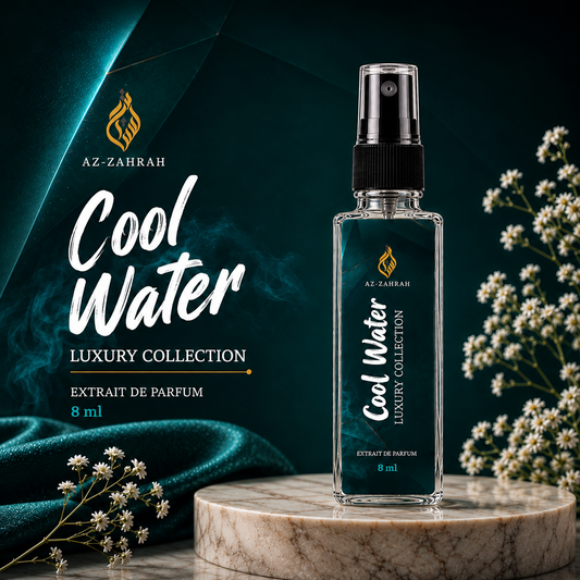 A 9 ml spray bottle of Az-Zahrah Cool Water Luxury Collection extrait de parfum, displayed on a marble pedestal against a dark teal background with decorative white flowers and draped fabric.